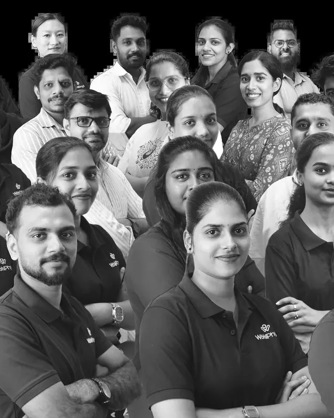 Wohl Physio staff together, in black and white.