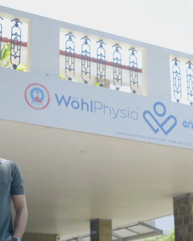 The Wohl Physio sign above a clinic entrance.